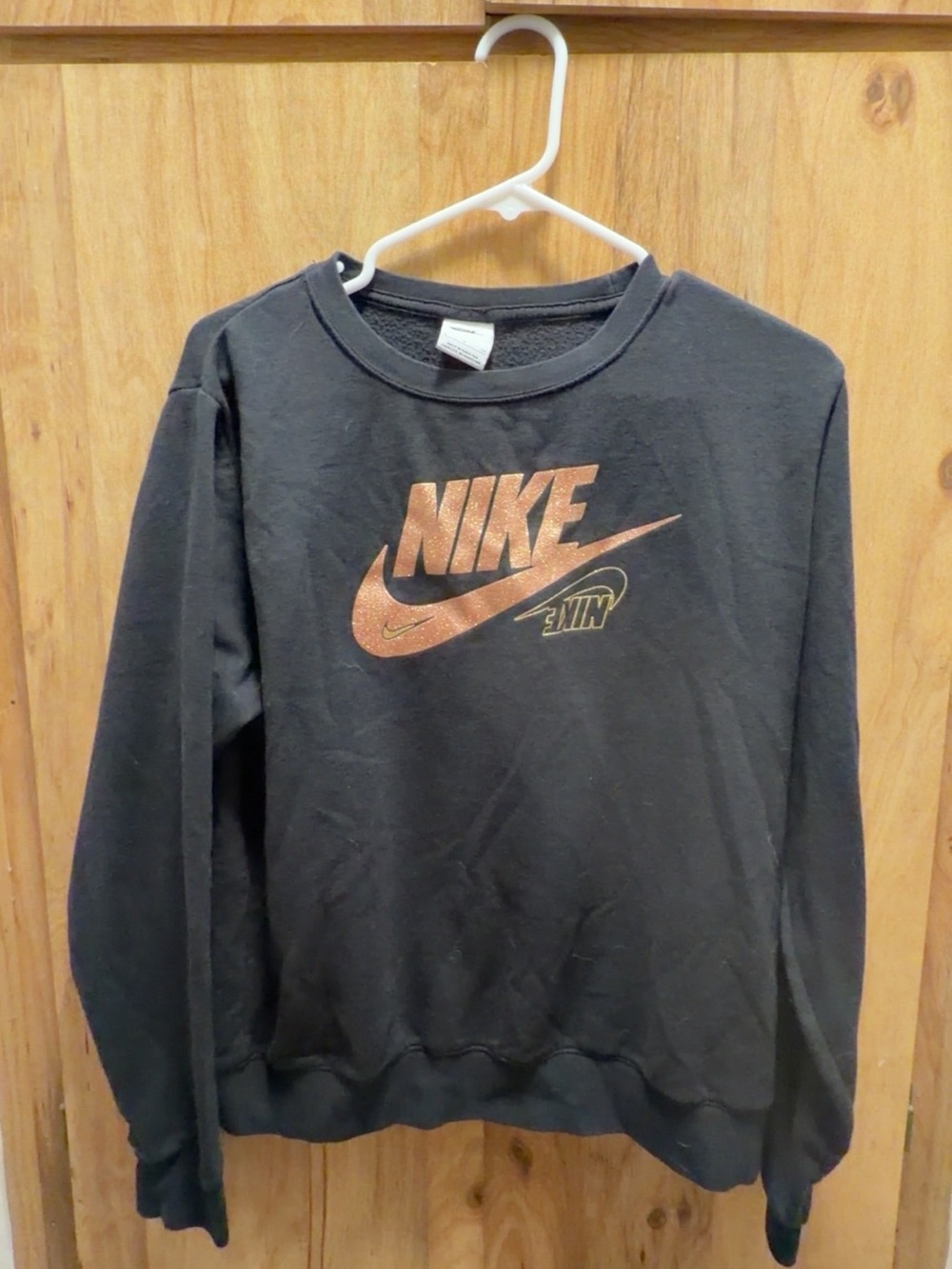 Nike Black Crewneck Sweatshirt with Copper Metallic Logo